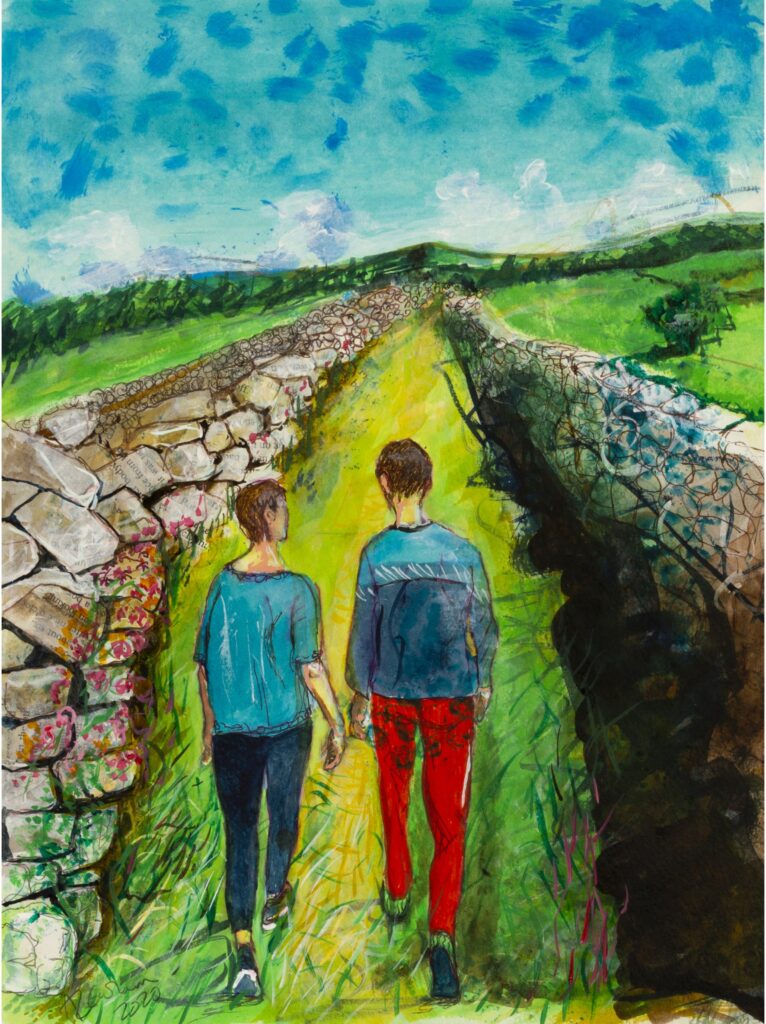 Two young people walking in the country