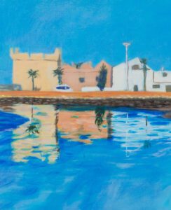 Some buildings reflectted in sea water